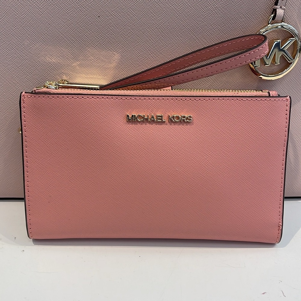 MICHAEL KORS
Jet Set Large Leather Smartphone Wristlet Wallet
Primrose 
NWT - Picture 4 of 16